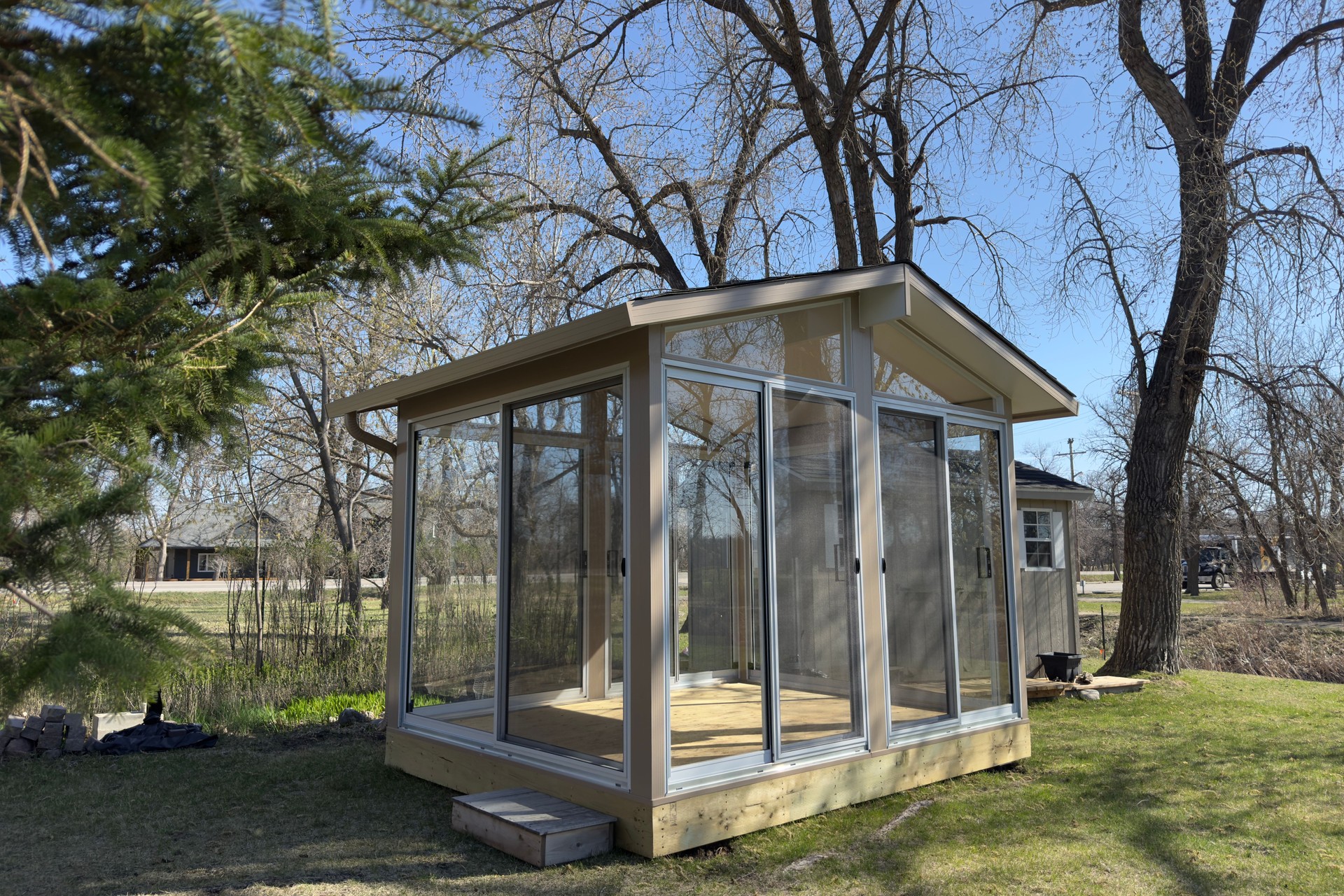 glass gazebo in the backyard